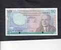 Tunisia 10 Dinars Punched P.65 -